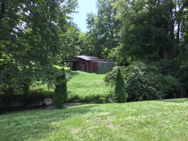 6737 Holt Road Nashville, TN 37211 - Photo 28 of 28 The storage barn is just across the creek-lots of potential.It is in "as-is" condition.