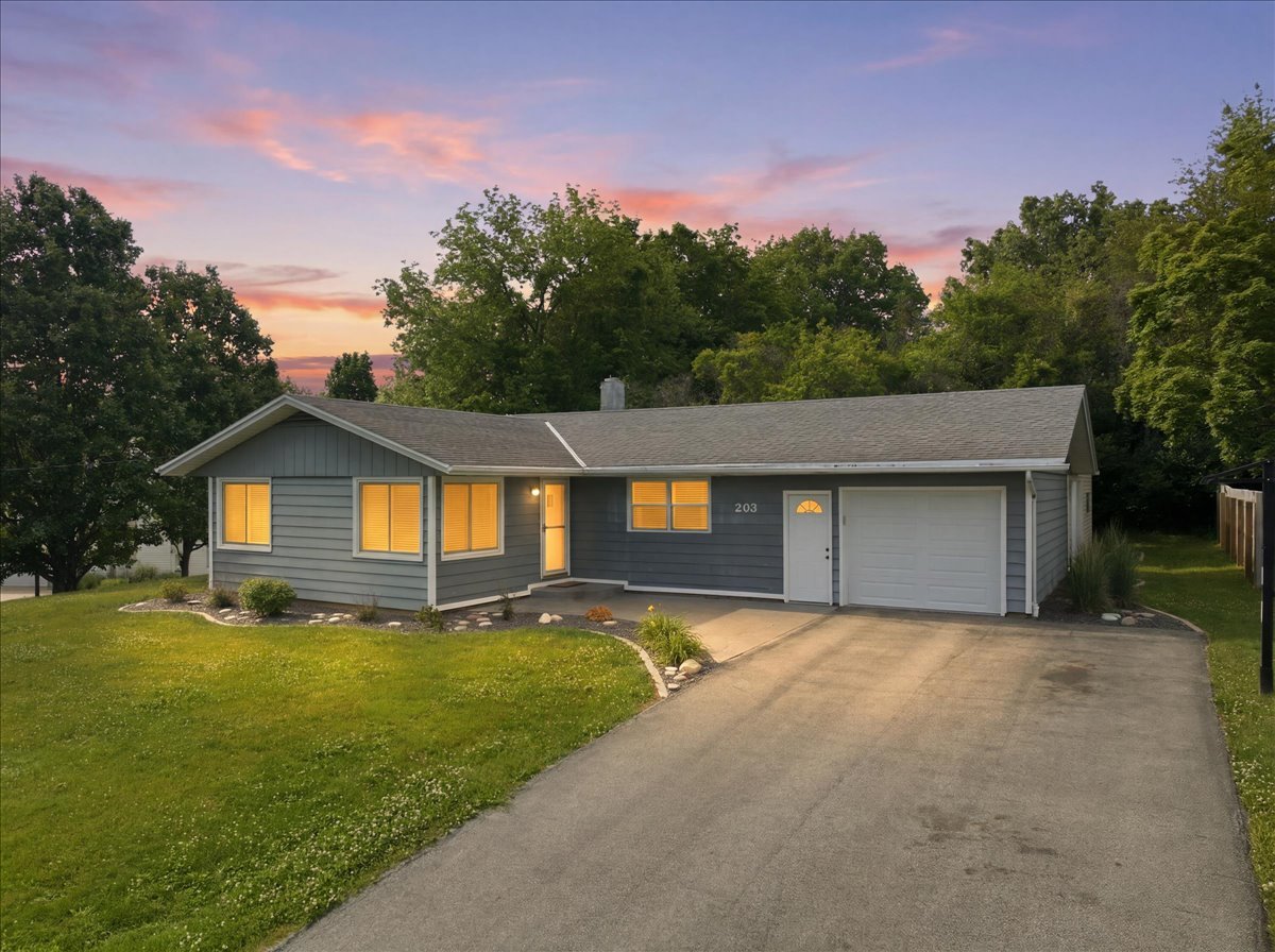 203 Highview Drive Eureka, IL 61530 - Photo 1 of 49 a front view of a house with yard and trees