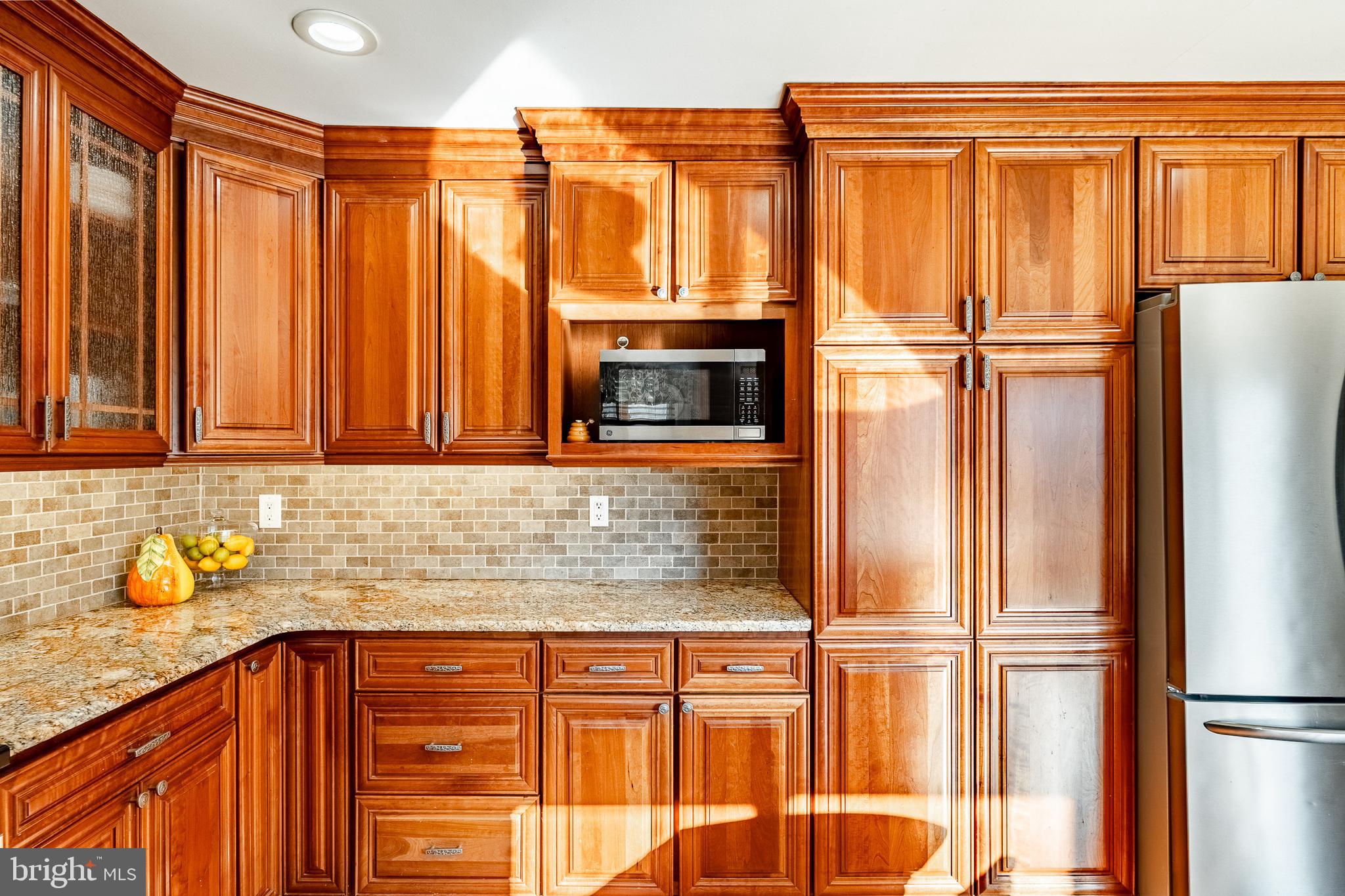 3920 Darby Road Bryn Mawr, PA 19010 - Photo 16 of 54 a kitchen with stainless steel appliances granite countertop a refrigerator and a sink
