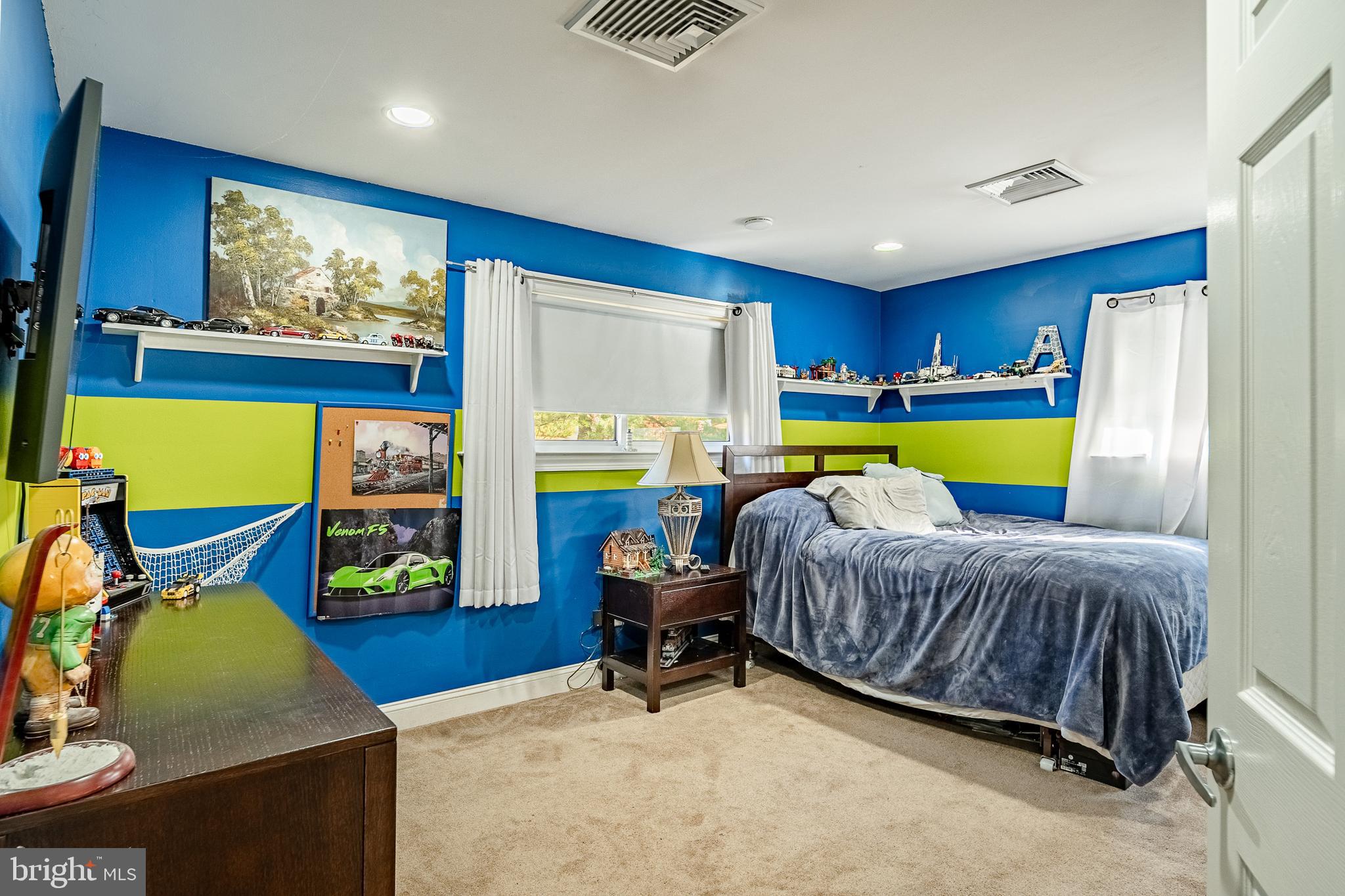 3920 Darby Road Bryn Mawr, PA 19010 - Photo 18 of 54 a bedroom with a bed chair and a window