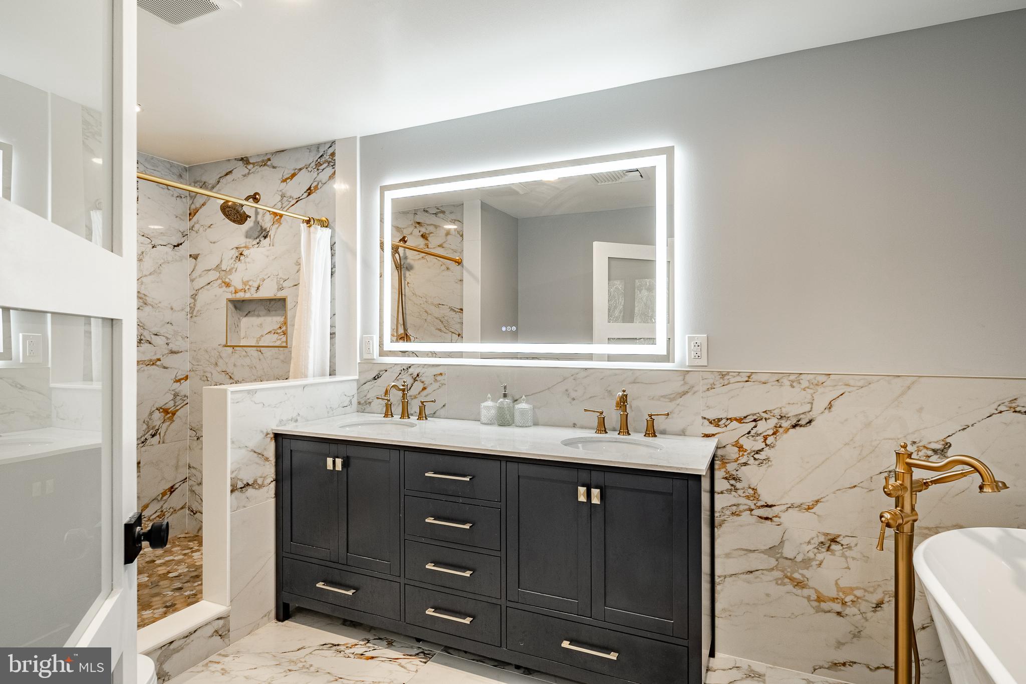 3920 Darby Road Bryn Mawr, PA 19010 - Photo 26 of 54 a bathroom with a double vanity sink mirror and