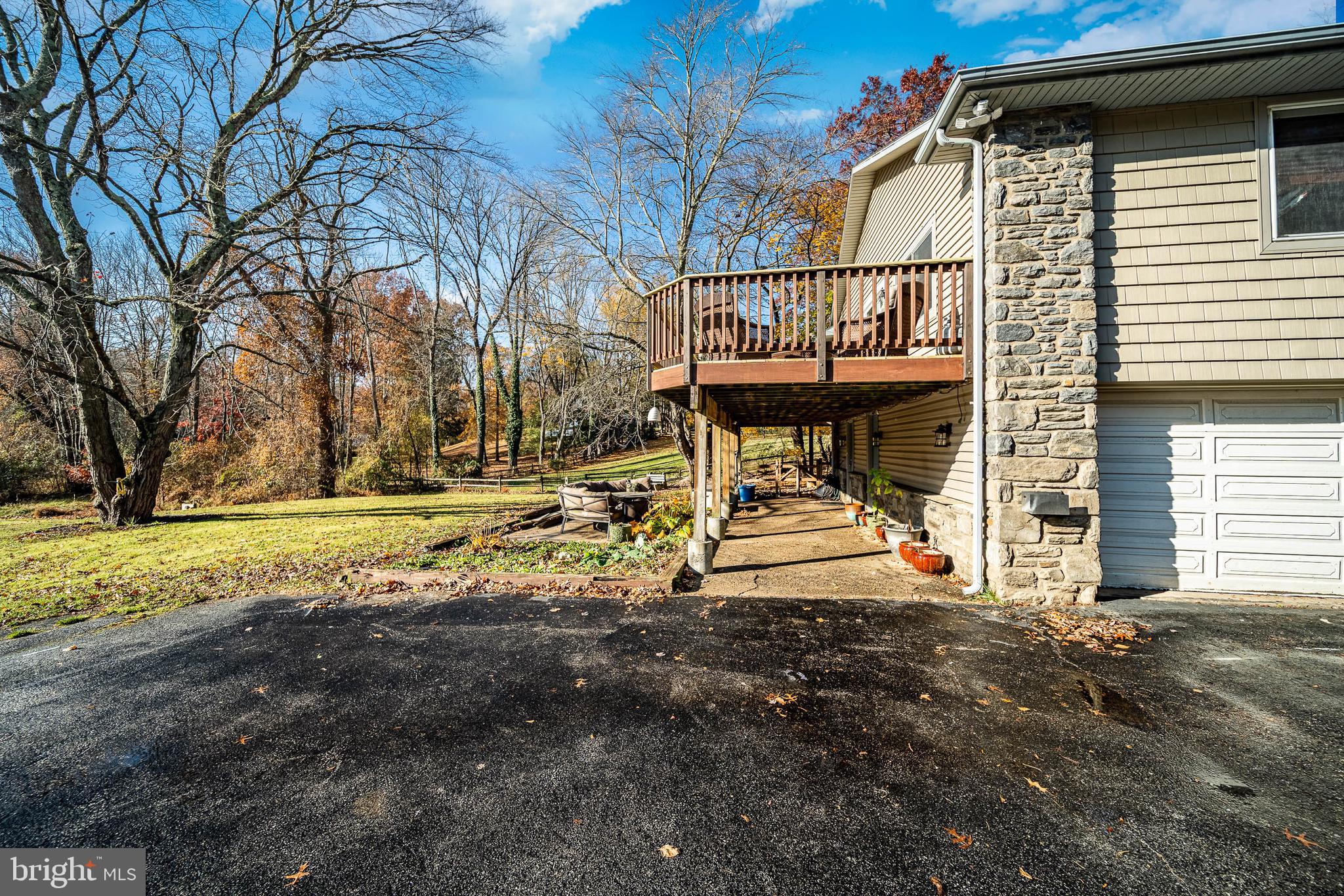 3920 Darby Road Bryn Mawr, PA 19010 - Photo 40 of 54 a view of a house with backyard and a tree