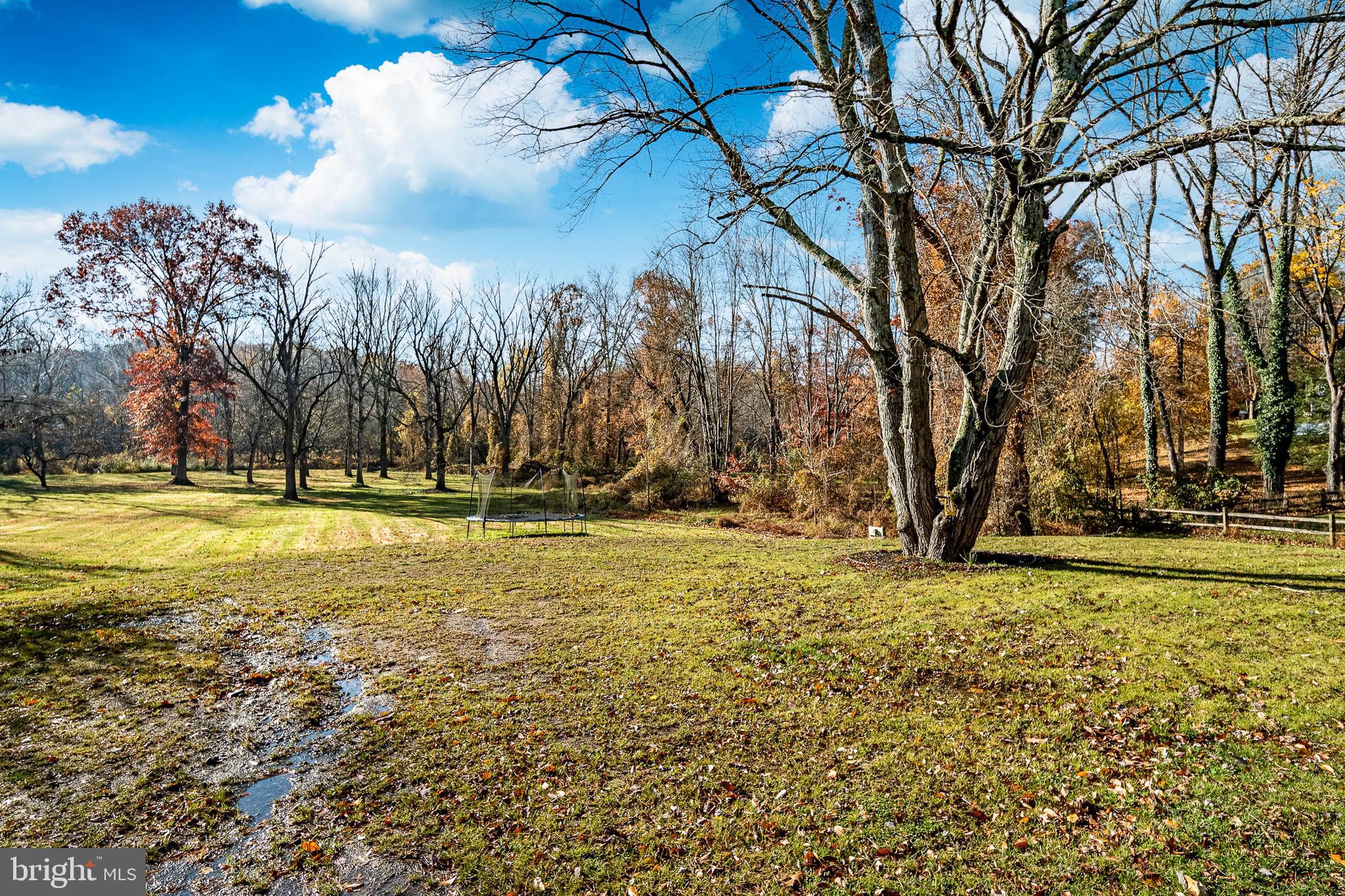 3920 Darby Road Bryn Mawr, PA 19010 - Photo 41 of 54 a view of swimming pool with an outdoor space and seating