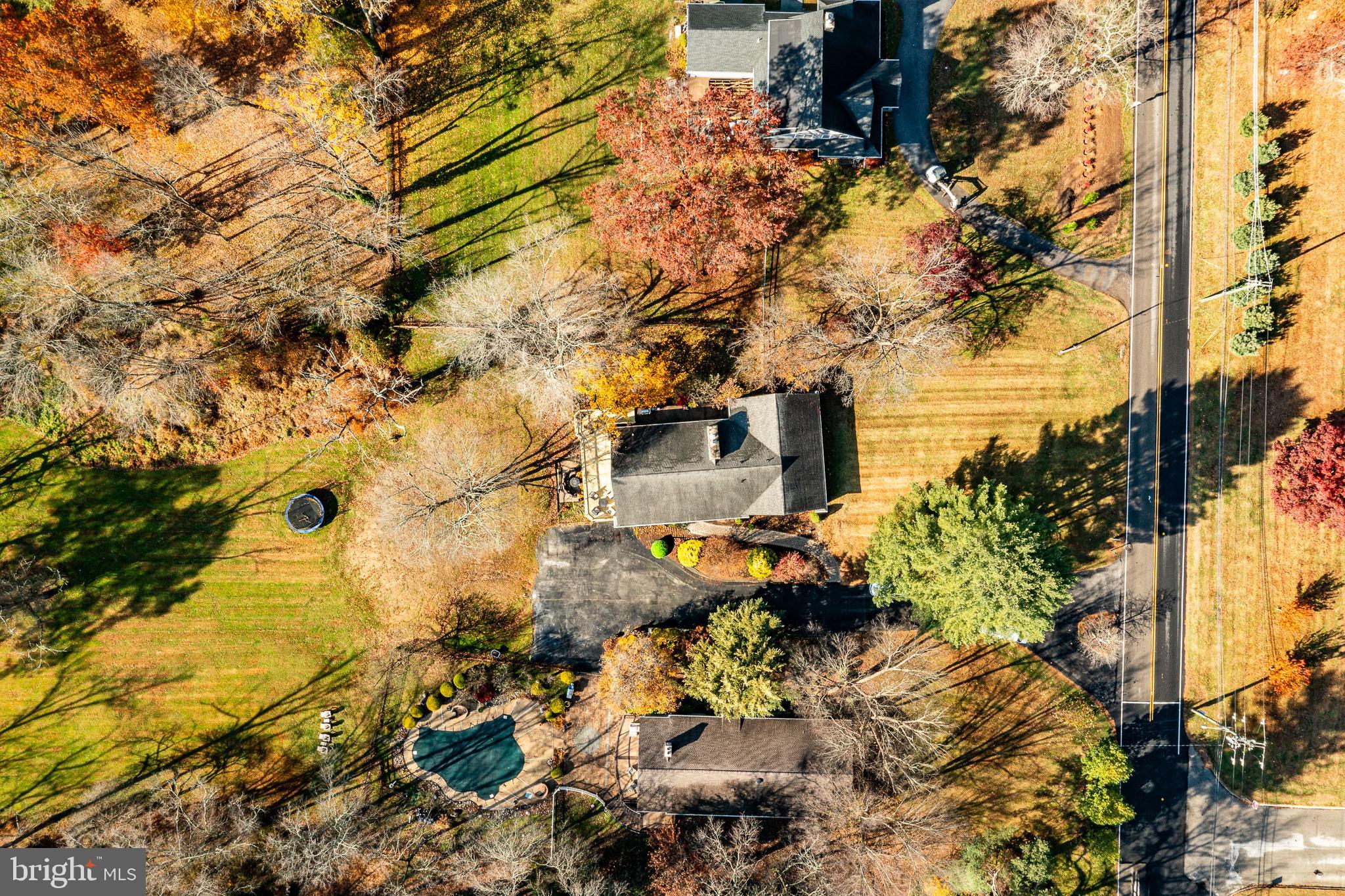 3920 Darby Road Bryn Mawr, PA 19010 - Photo 50 of 54 a backyard of a building with large trees