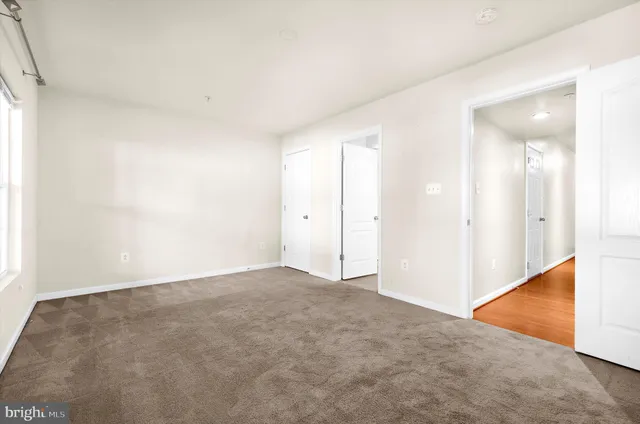 an empty room with an entryway