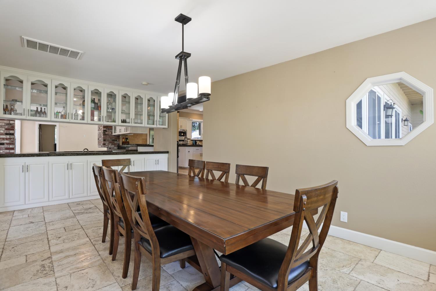 9935 Hazel Road Stockton, CA 95212 - Photo 20 of 98 a view of a dining room with furniture