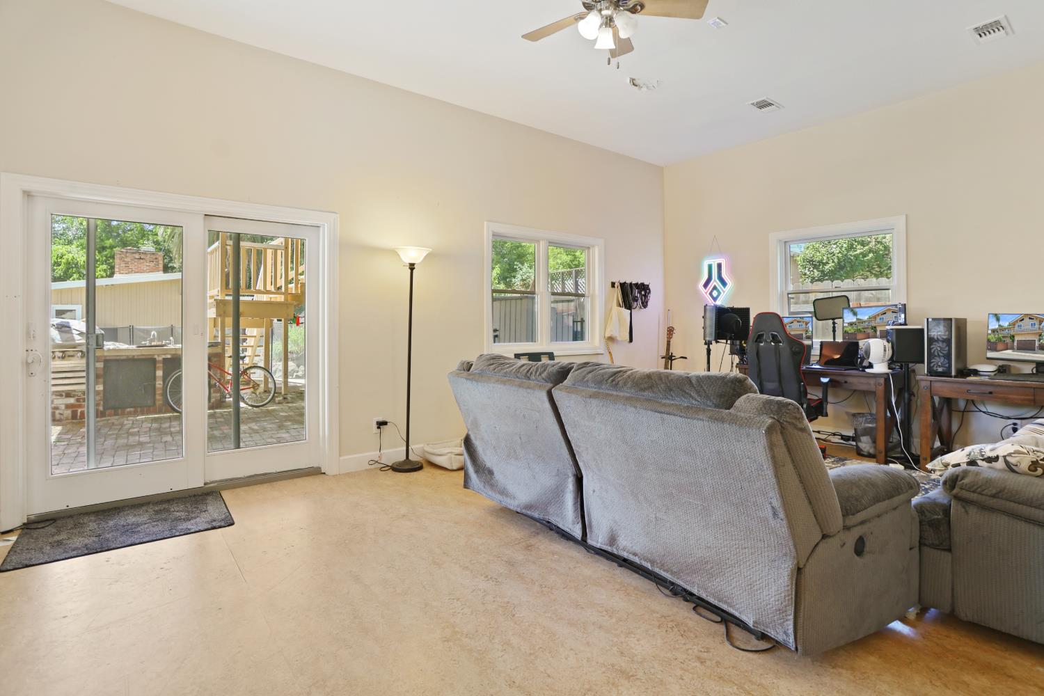 9935 Hazel Road Stockton, CA 95212 - Photo 39 of 98 a living room with furniture and a large window