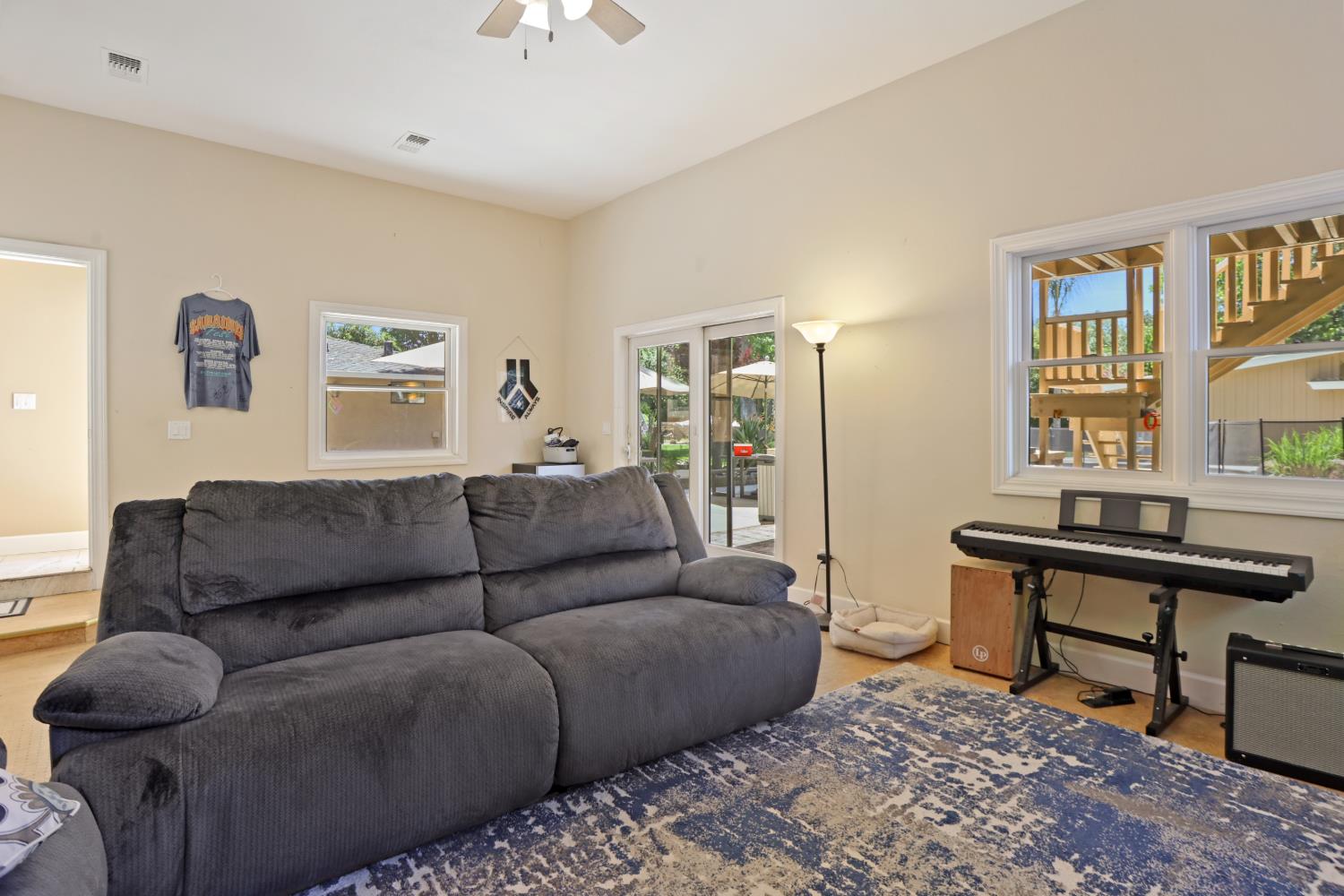 9935 Hazel Road Stockton, CA 95212 - Photo 41 of 98 a living room with furniture and a window