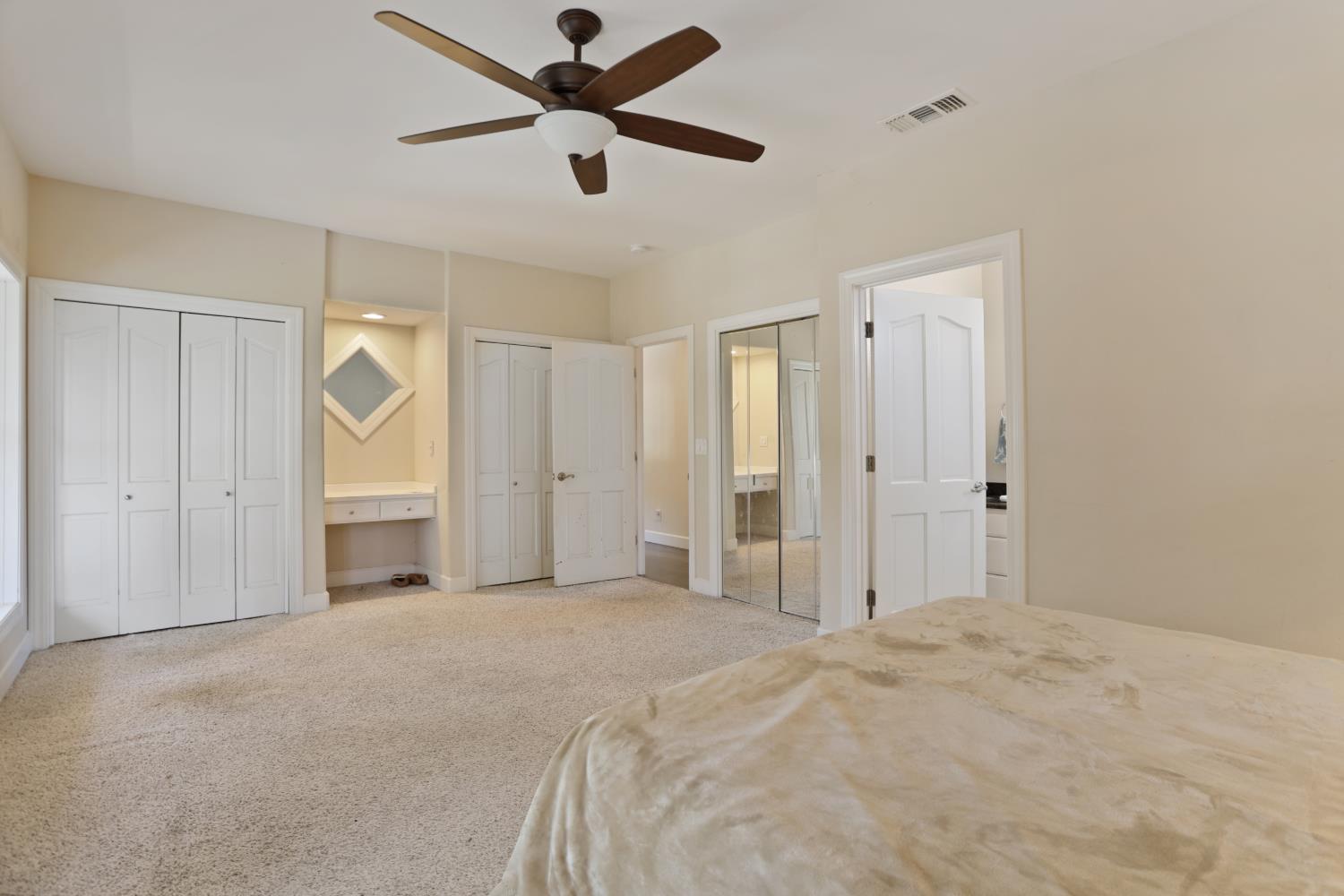 9935 Hazel Road Stockton, CA 95212 - Photo 45 of 98 a view of a big room with closet and a ceiling fan