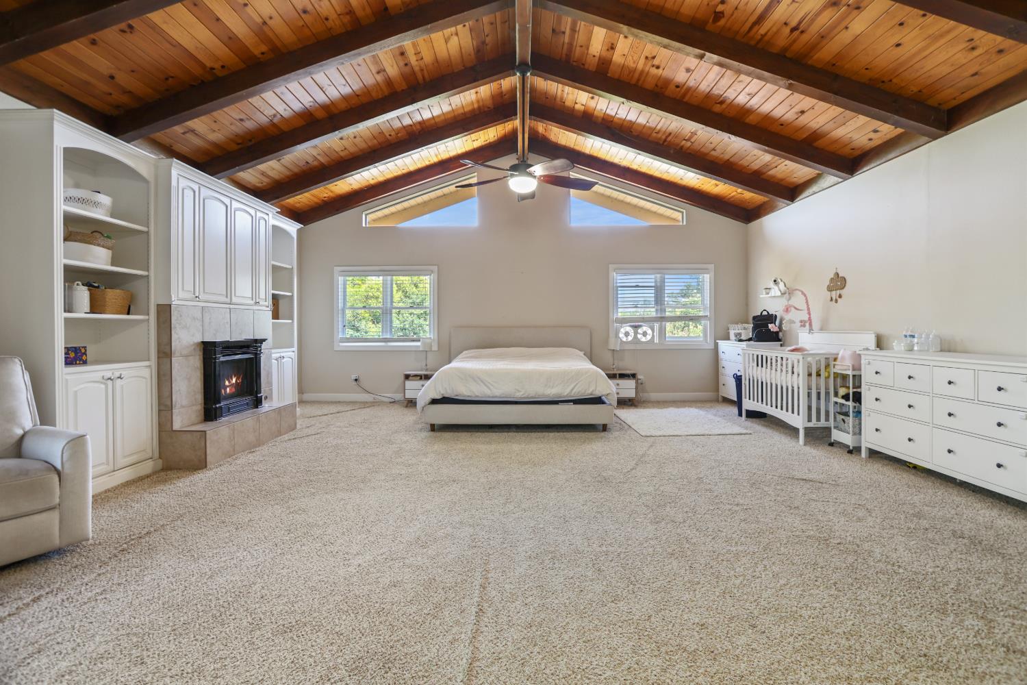 9935 Hazel Road Stockton, CA 95212 - Photo 58 of 98 a spacious bedroom with furniture and a ceiling fan
