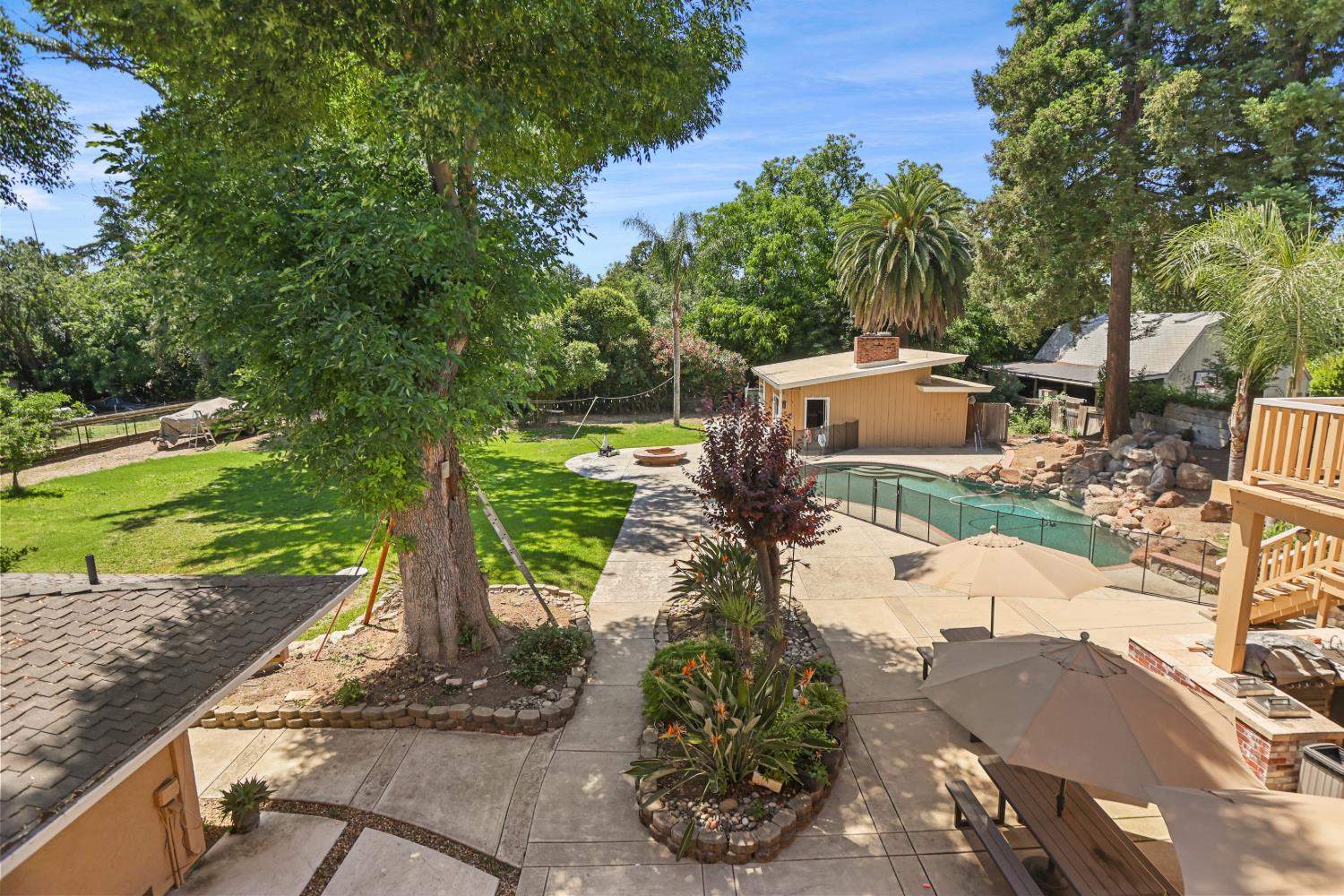 9935 Hazel Road Stockton, CA 95212 - Photo 72 of 98 a view of a backyard with sitting area