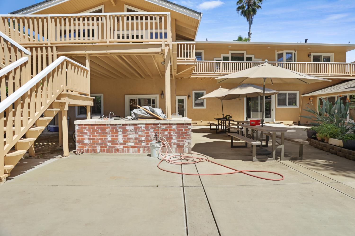 9935 Hazel Road Stockton, CA 95212 - Photo 79 of 98 a view of a patio with couches table and chairs