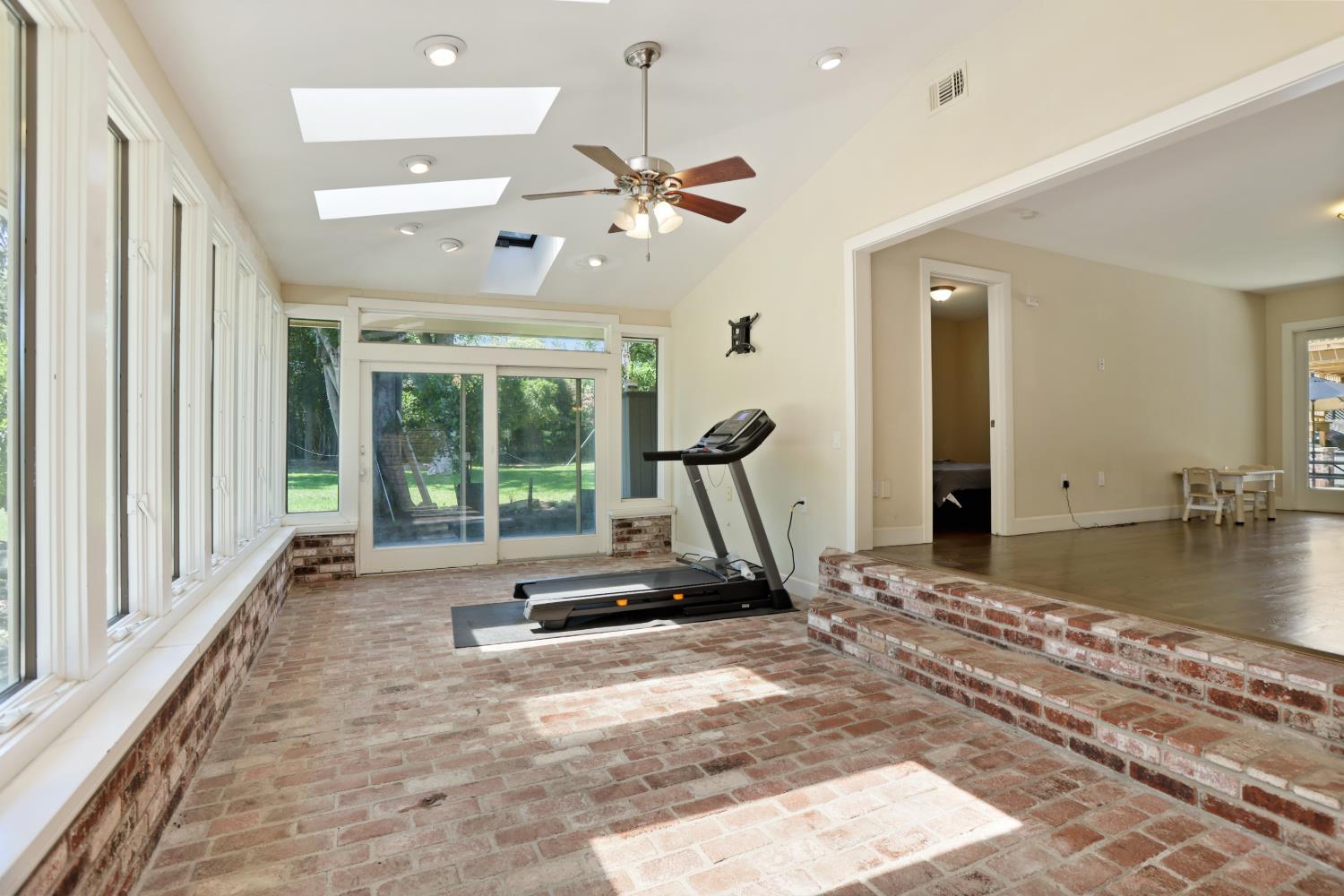 9935 Hazel Road Stockton, CA 95212 - Photo 9 of 98 a view of a room with gym equipment