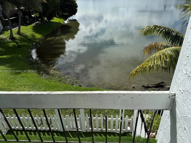 a view of a lake from a balcony
