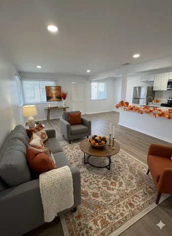 a spacious bedroom with a bed and a couch