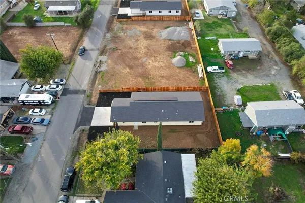 an aerial view of a house with a garden