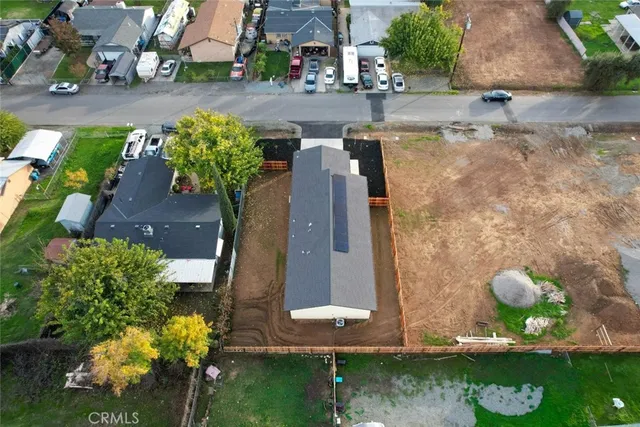 a view of a pond with a flower in a garden