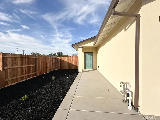 a view of a pathway of a house with wooden floor