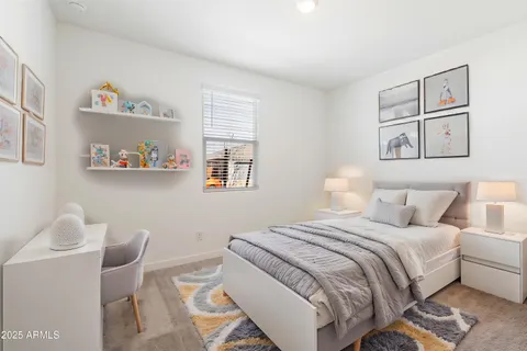 a bathroom with double sink and a mirror