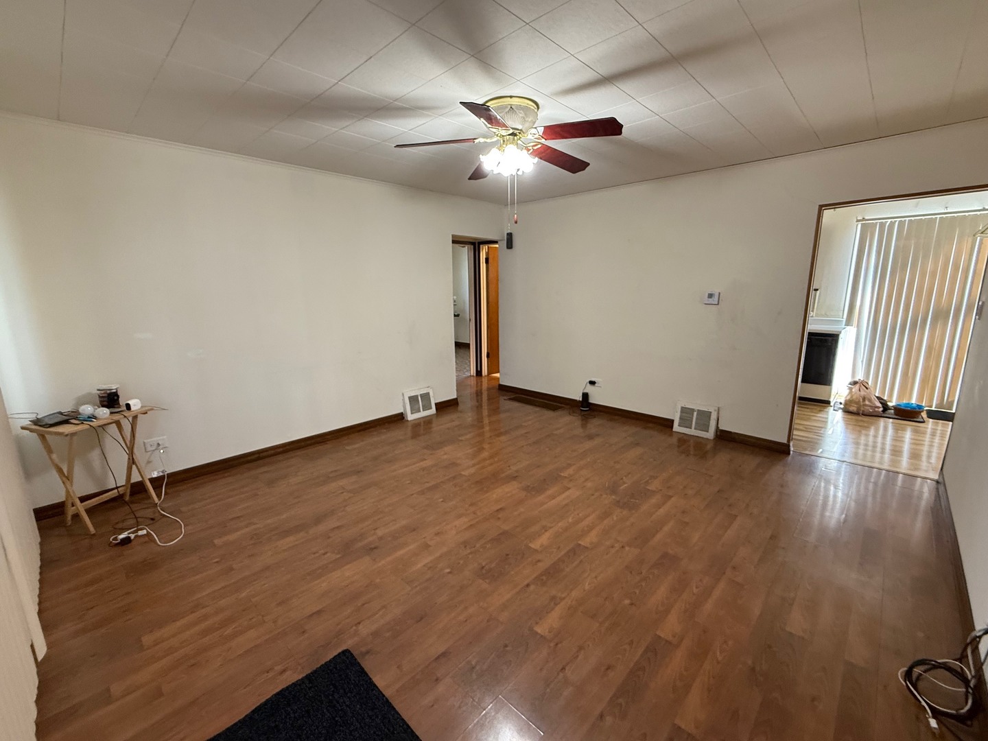2521 Dakota Road Waukegan, IL 60087 - Photo 14 of 29 wooden floor in an empty room with a window