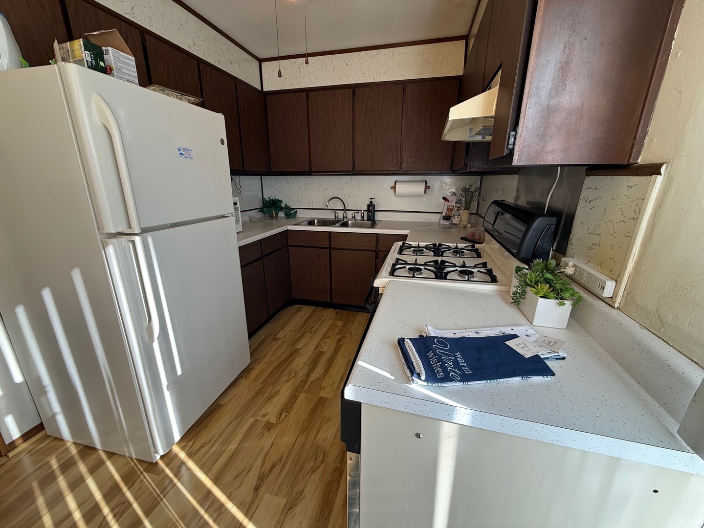 2521 Dakota Road Waukegan, IL 60087 - Photo 7 of 29 a kitchen with a refrigerator a stove and a sink