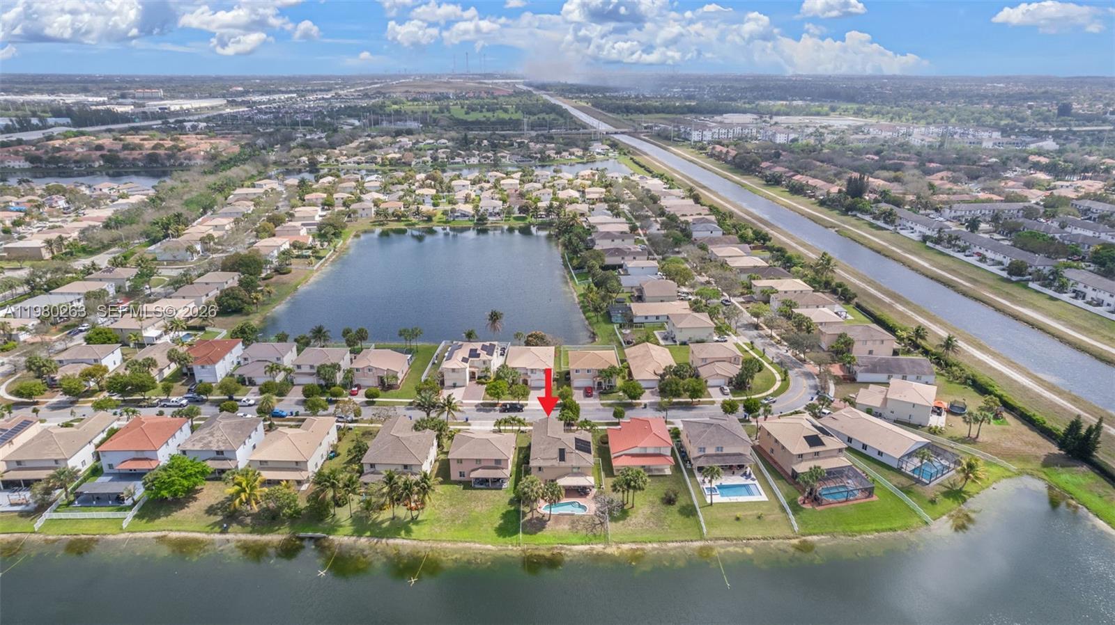 4628 Southwest 129th Avenue Miramar, FL 33027 - Photo 6 of 36 an aerial view of residential houses with outdoor space