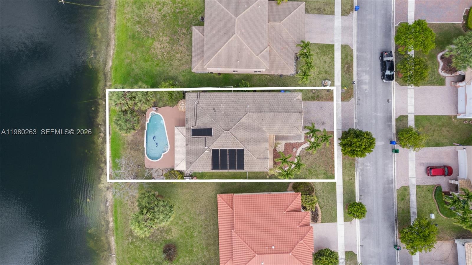 4628 Southwest 129th Avenue Miramar, FL 33027 - Photo 7 of 36 an aerial view of house with swimming pool