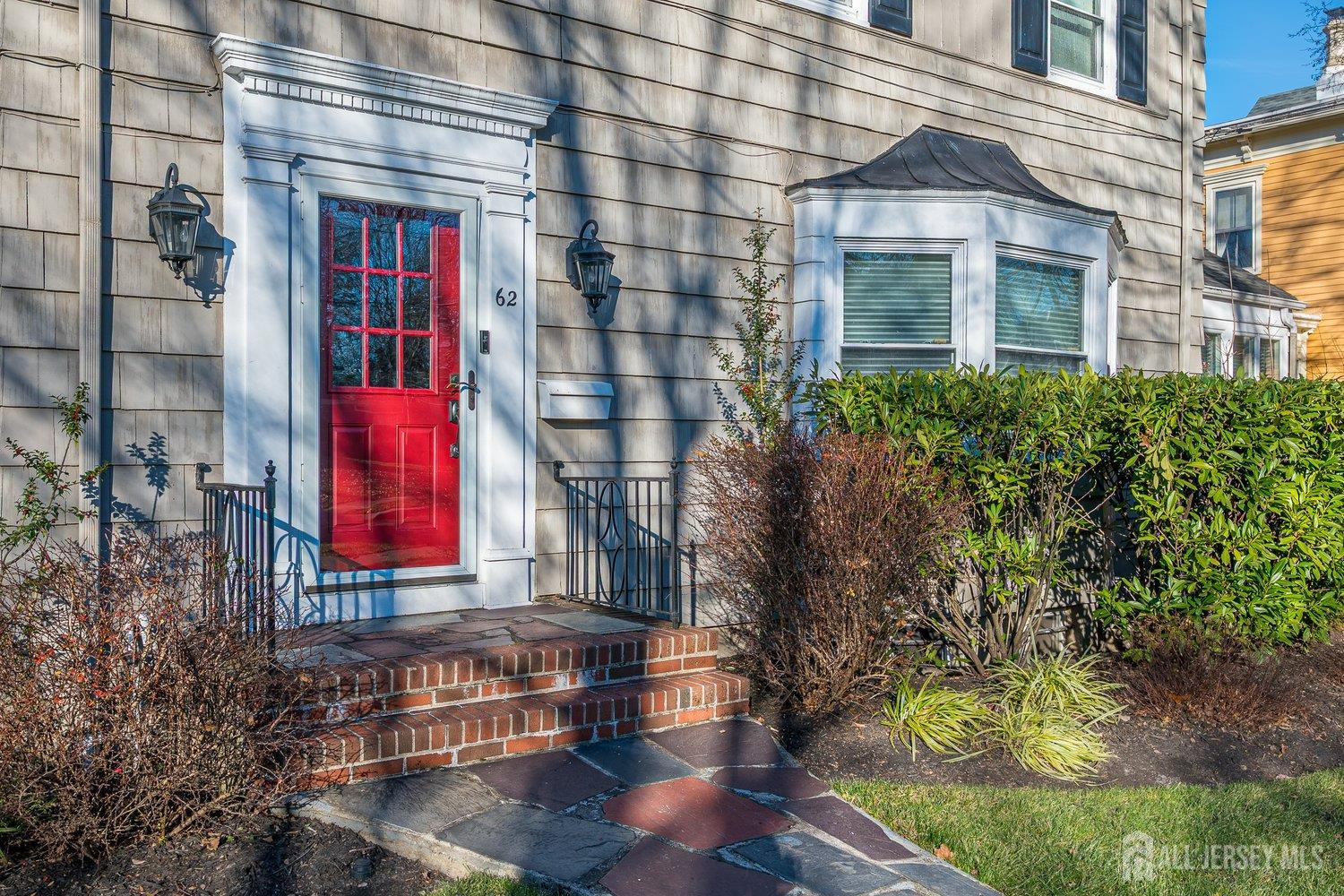 62 Spring Street Metuchen, NJ 08840 - Photo 13 of 47 a front view of a house with a yard