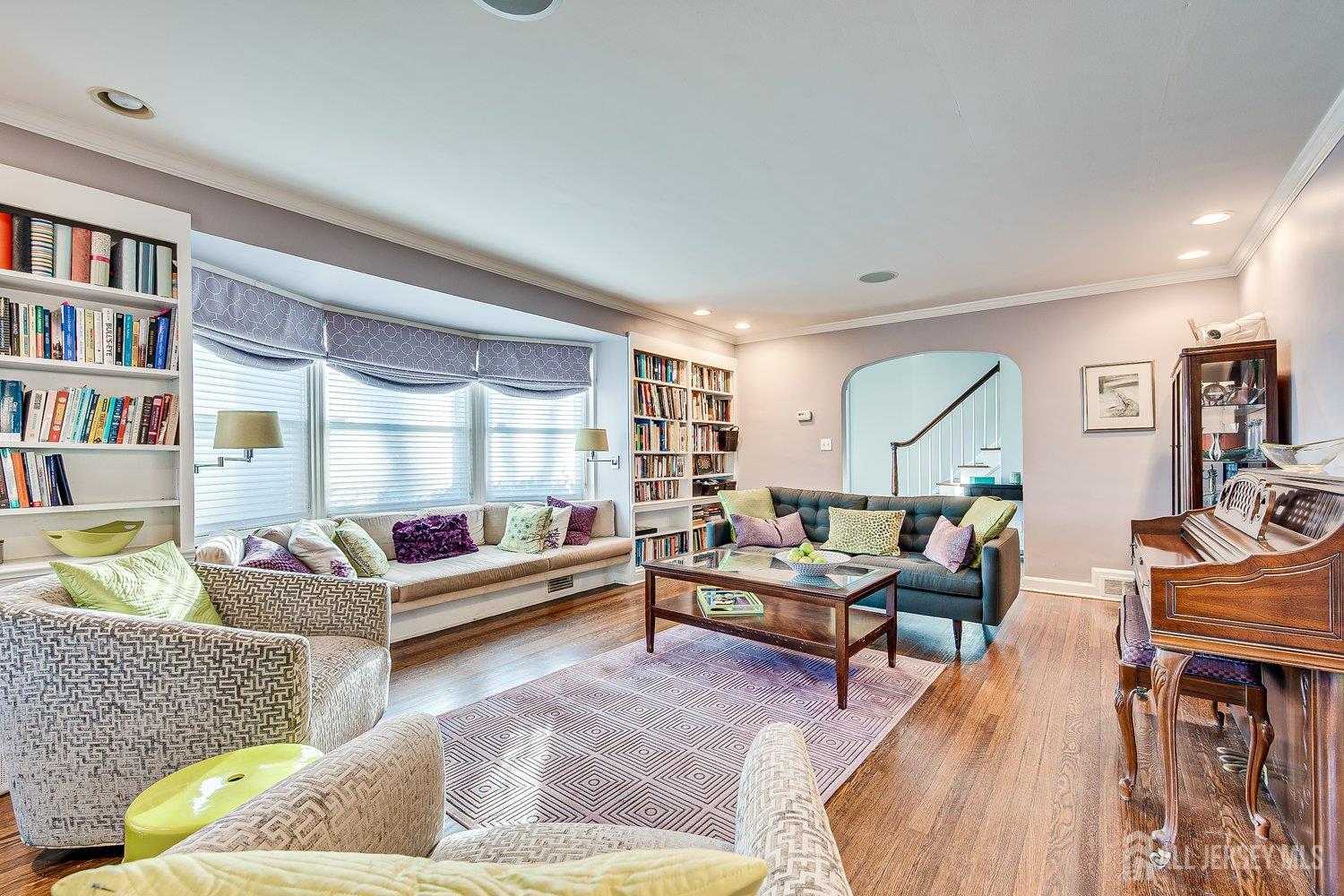 62 Spring Street Metuchen, NJ 08840 - Photo 14 of 47 a living room with furniture and a wooden floor