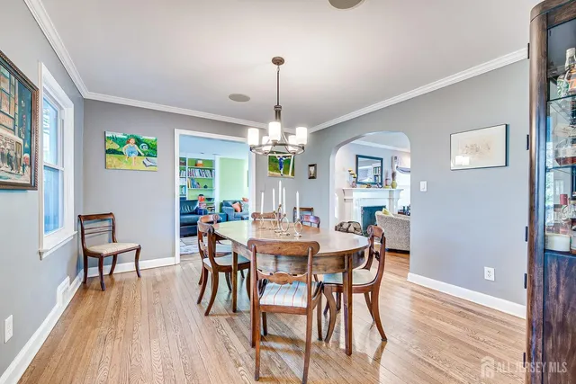 a living room with furniture fireplace and flat screen tv