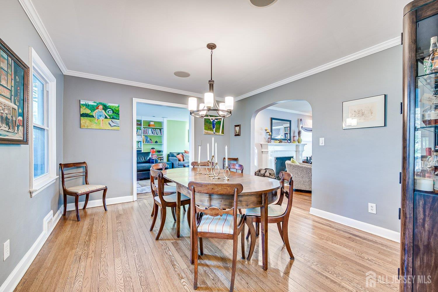 62 Spring Street Metuchen, NJ 08840 - Photo 16 of 47 a view of a dining room with furniture window and wooden floor