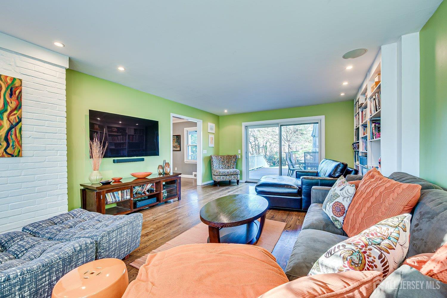 62 Spring Street Metuchen, NJ 08840 - Photo 18 of 47 a living room with furniture fireplace and flat screen tv