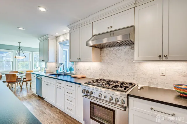 a bathroom with a sink toilet and vanity