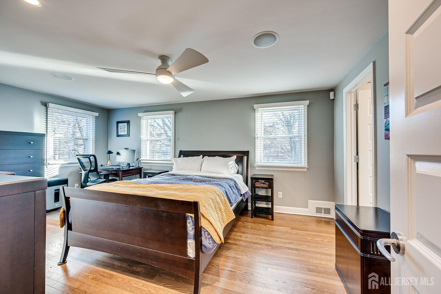 62 Spring Street Metuchen, NJ 08840 - Photo 27 of 47 a bed room with a bed and a tv