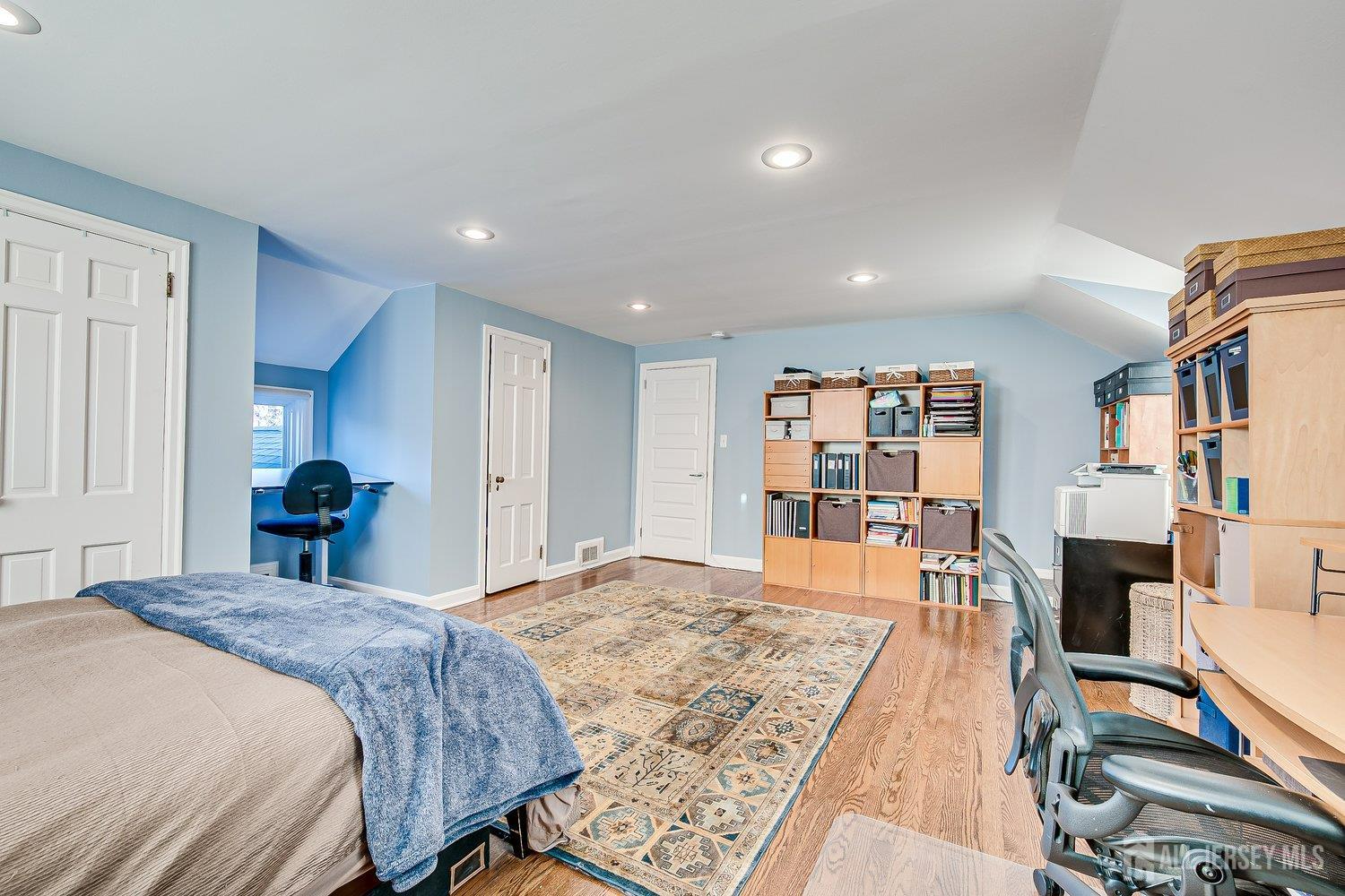 62 Spring Street Metuchen, NJ 08840 - Photo 34 of 47 a bed room with a bed and a book shelf