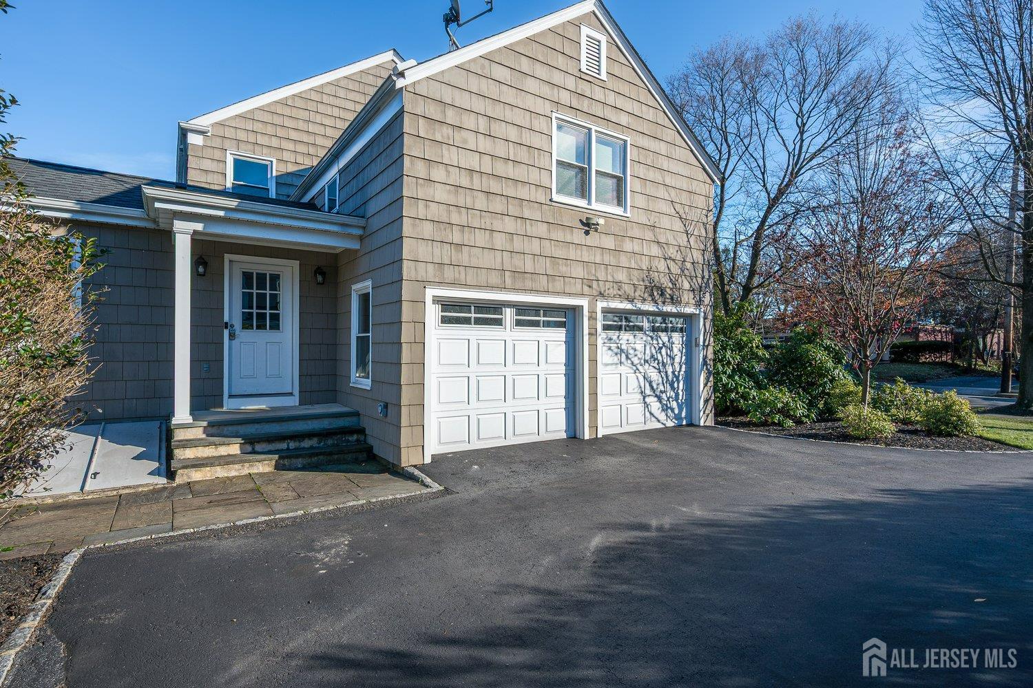 62 Spring Street Metuchen, NJ 08840 - Photo 37 of 47 a front view of a house with a yard