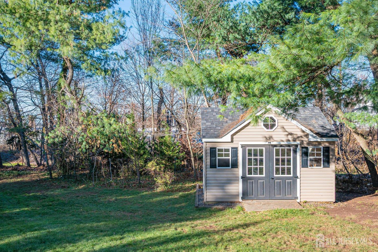 62 Spring Street Metuchen, NJ 08840 - Photo 38 of 47 a front view of a house with a yard
