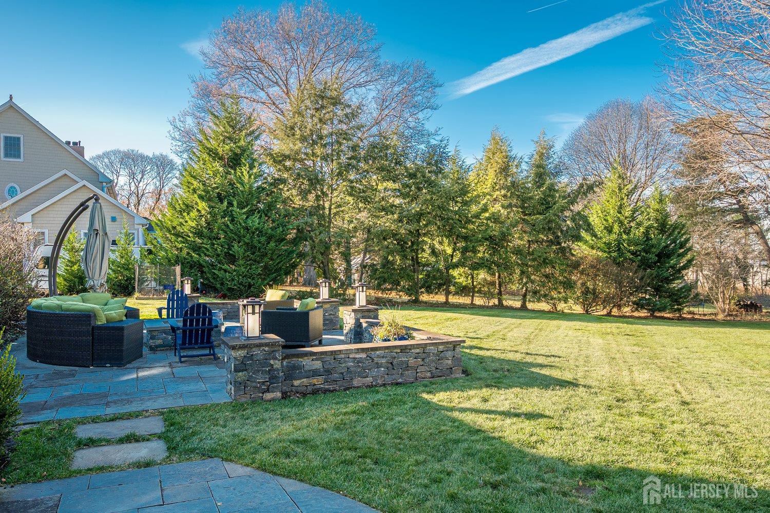 62 Spring Street Metuchen, NJ 08840 - Photo 39 of 47 a view of a house with backyard outdoor seating and green space