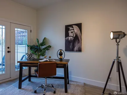 a room with a table and chairs