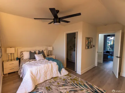 a bedroom with a bed and a view of bathroom