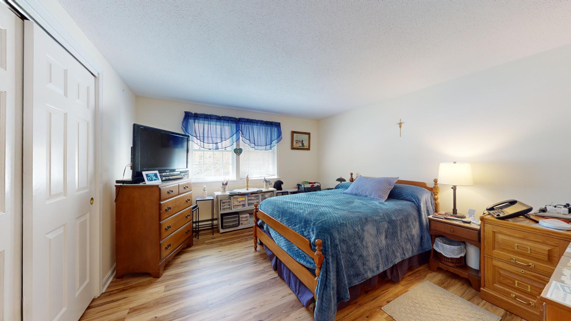 149 Flintlock Village, Unit 3 Wells, ME 04090 - Photo 11 of 24 Primary bedroom