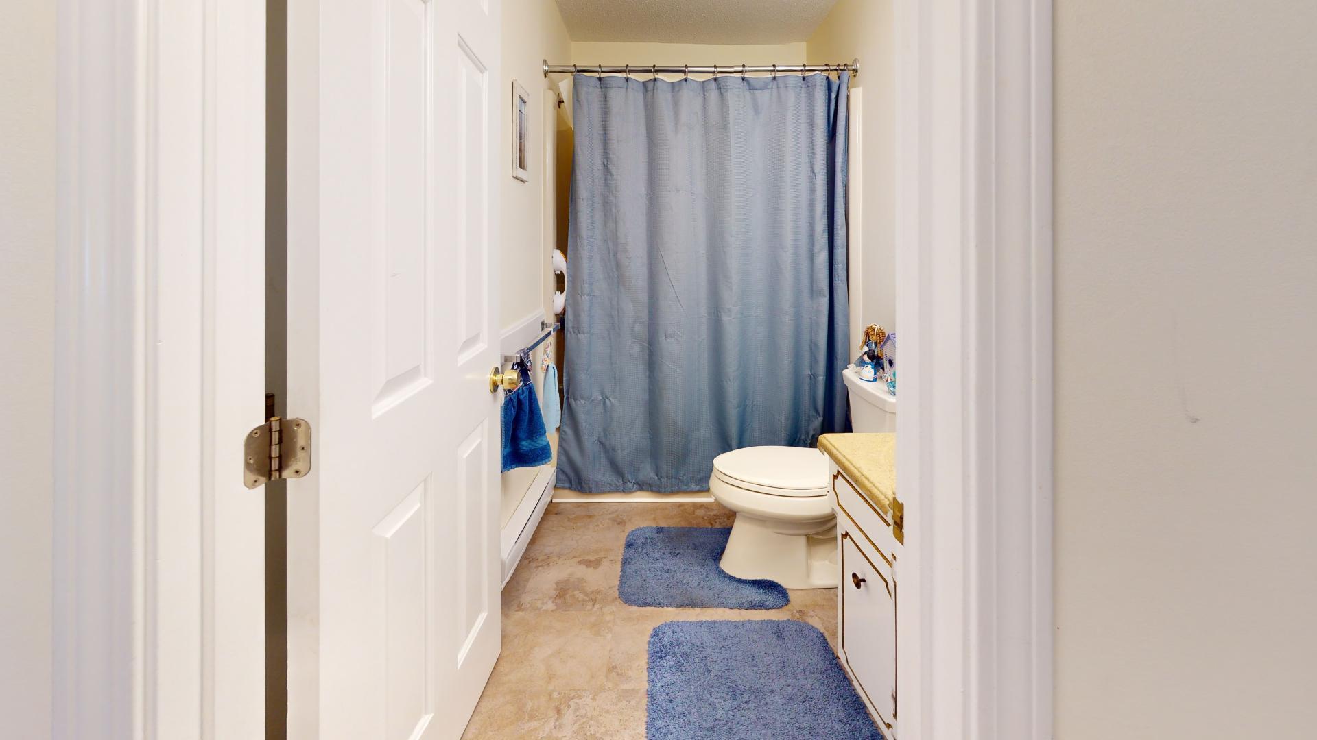 149 Flintlock Village, Unit 3 Wells, ME 04090 - Photo 14 of 24 Bath with tub/shower
