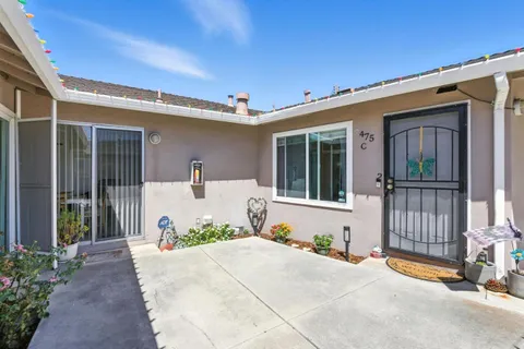 a front view of a house with a garage