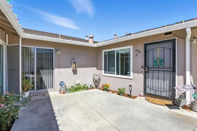a front view of a house with a garage