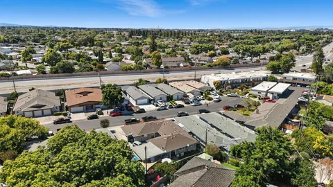 an aerial view of a city with lots of residential buildings