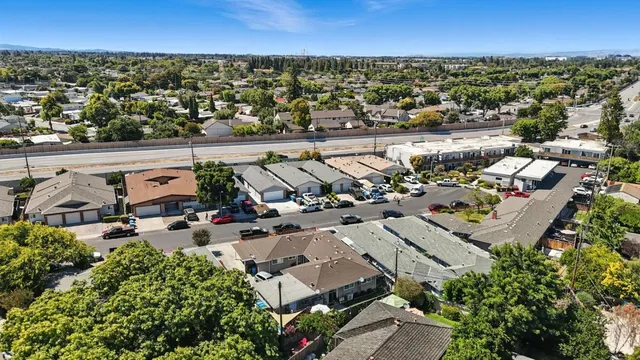 an aerial view of a city with lots of residential buildings