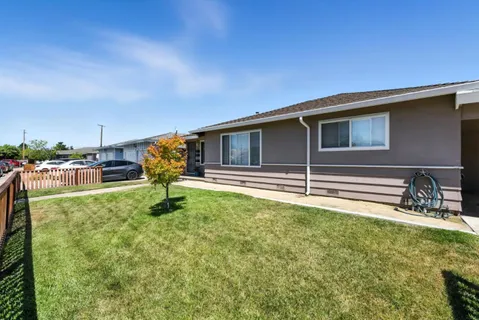 a house view with a garden space