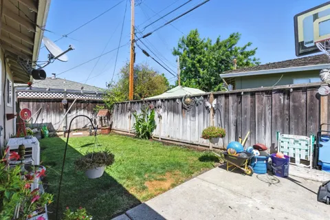 a view of a backyard with a patio