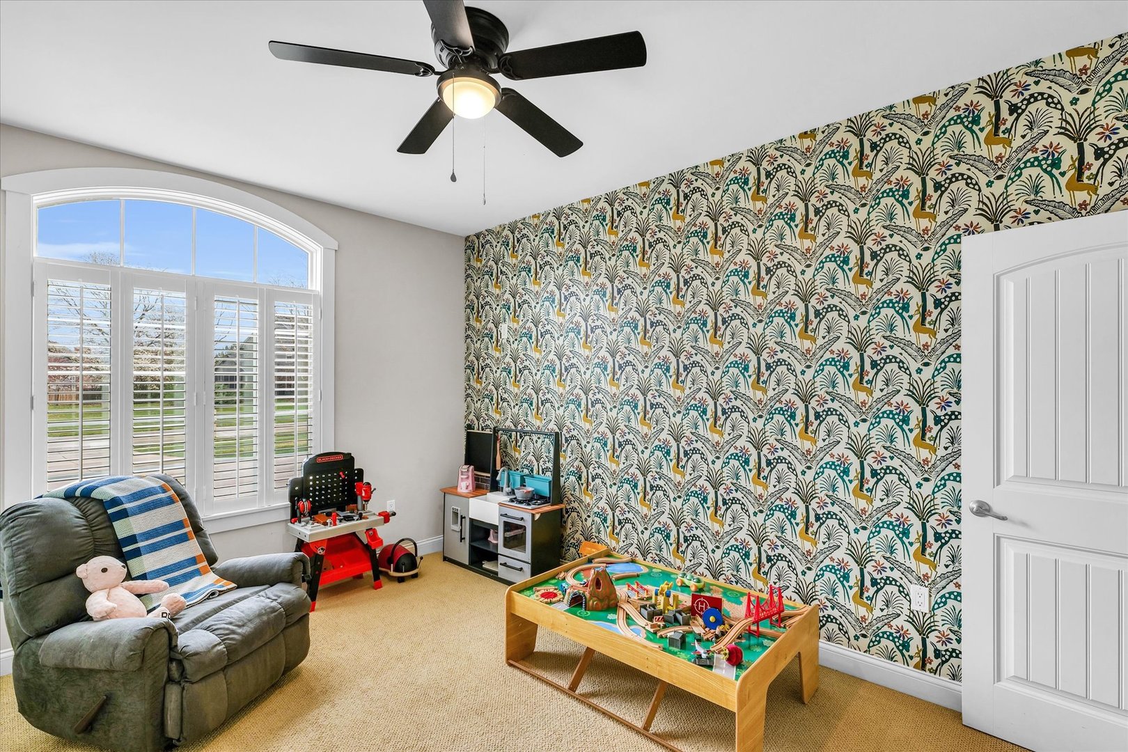 1803 Cobblefield Court Champaign, IL 61822 - Photo 24 of 55 a living room with furniture and a floor to ceiling window