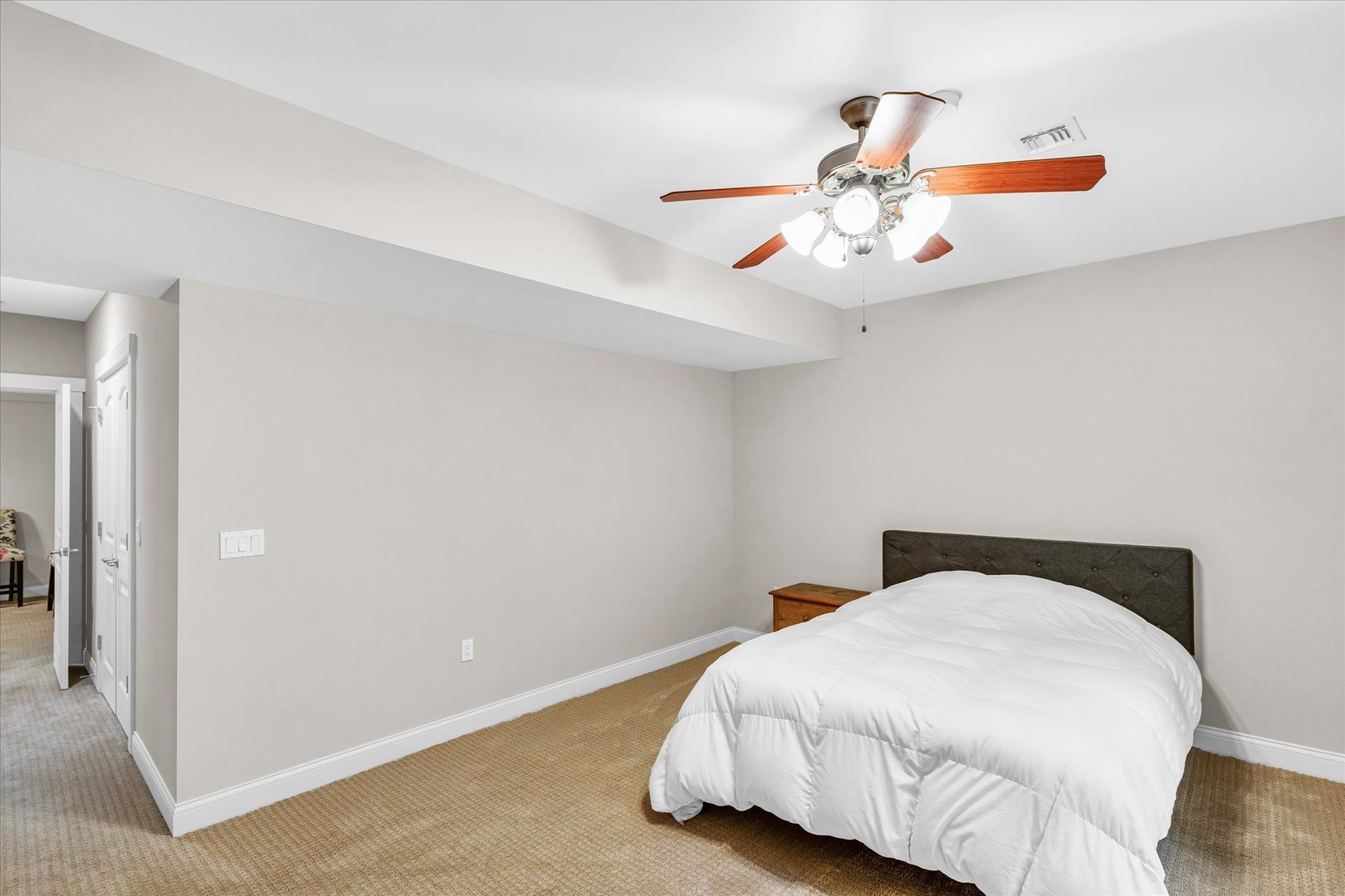 1803 Cobblefield Court Champaign, IL 61822 - Photo 46 of 55 a bedroom with a bed and cabinets